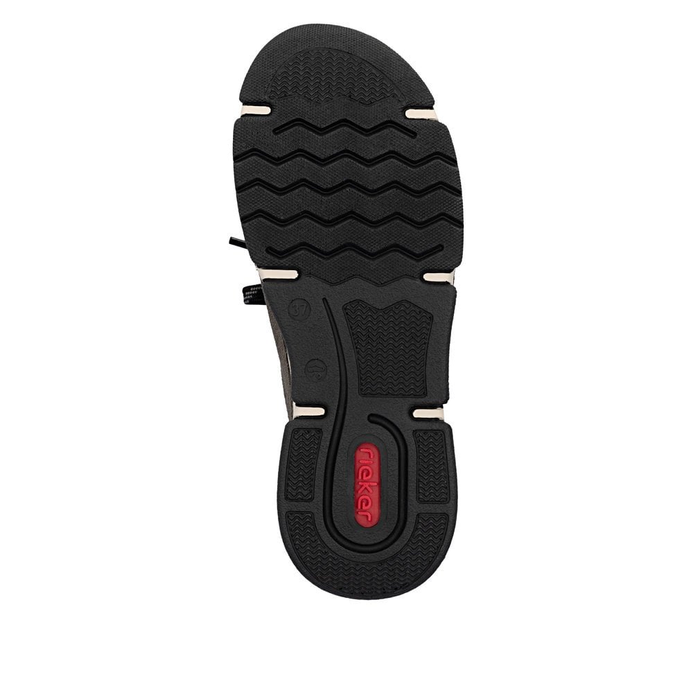 Women's suede slip-on shoe outsole view with textured tread and grippy heel