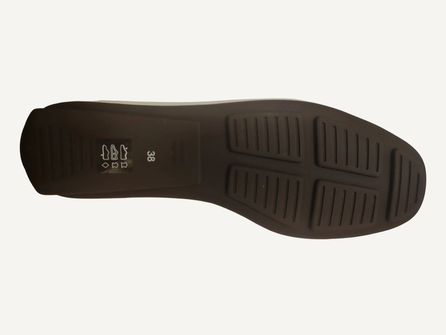 Brown shoe sole with brand logo on a white background