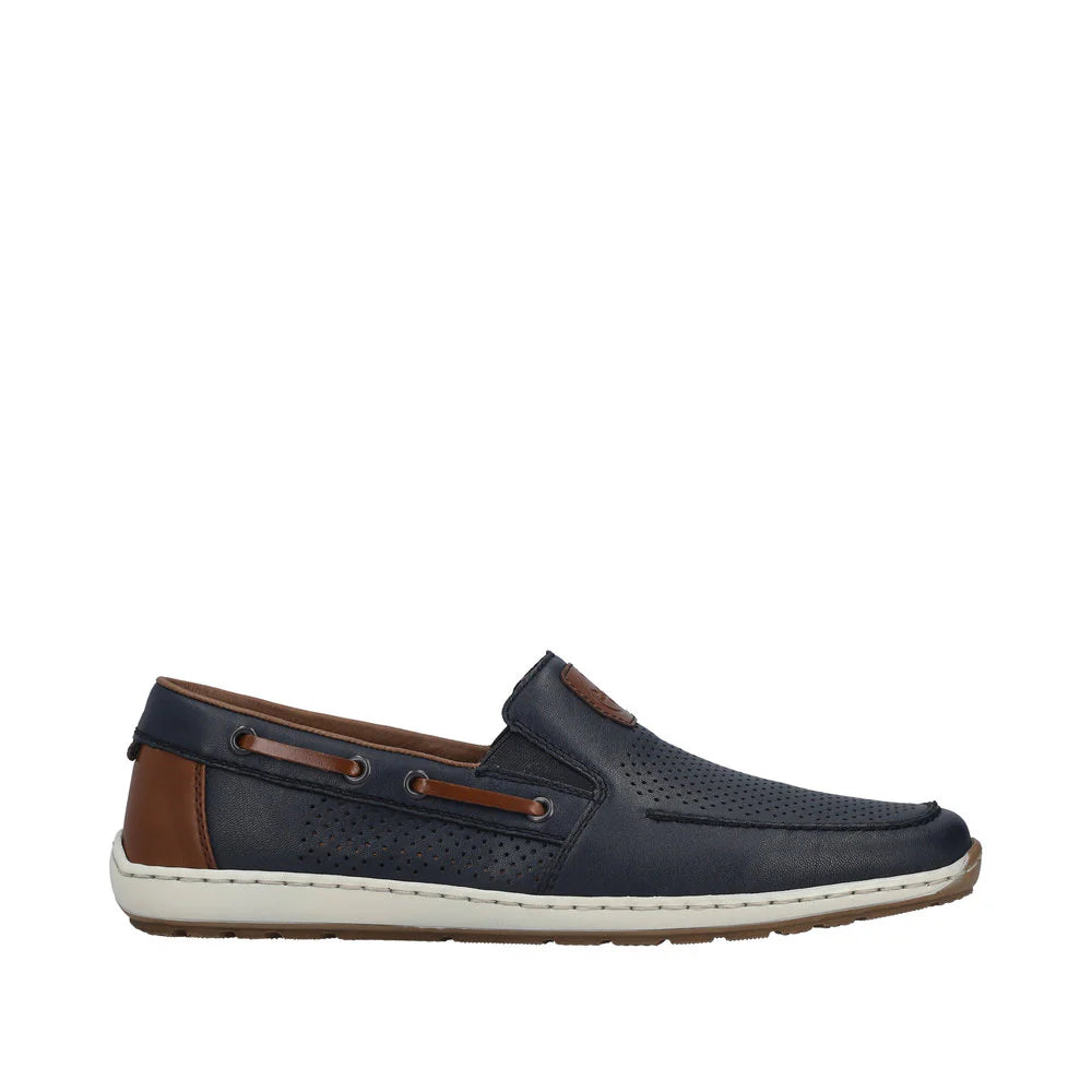 Navy slip-on shoe with brown accents on a white background