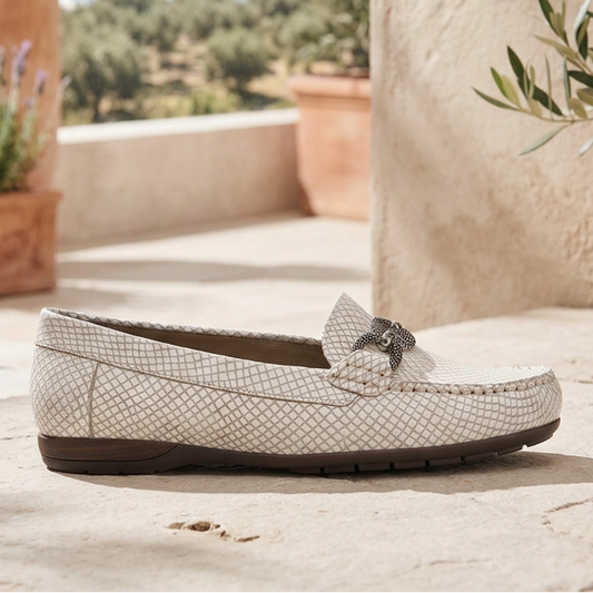 Women's white python-print loafer with bow accent and low-profile outsole