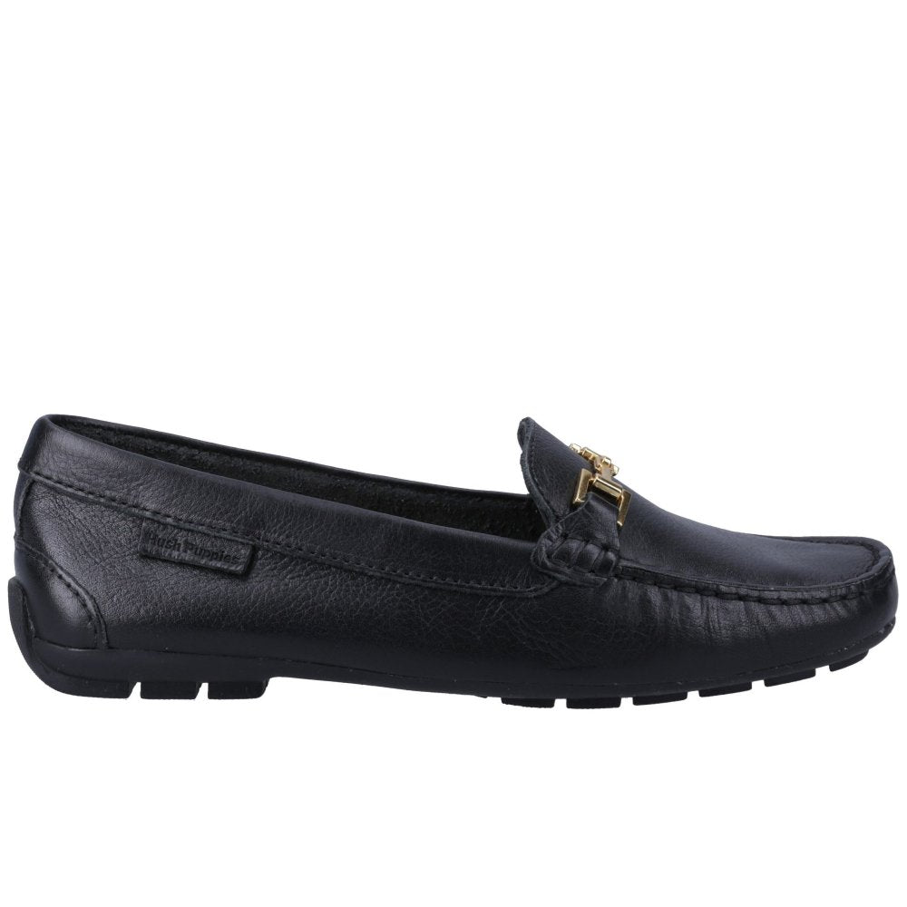 Black leather women's loafer front view with gold buckle strap and moc stitching