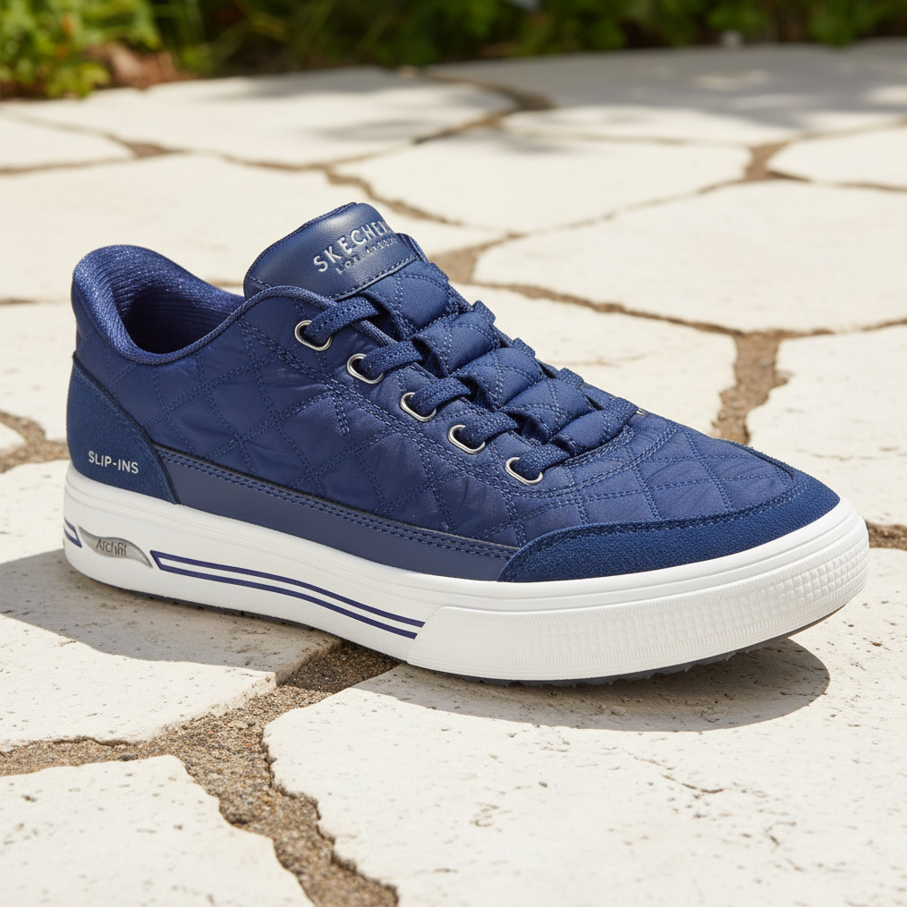 Blue sneaker with white sole on a white background