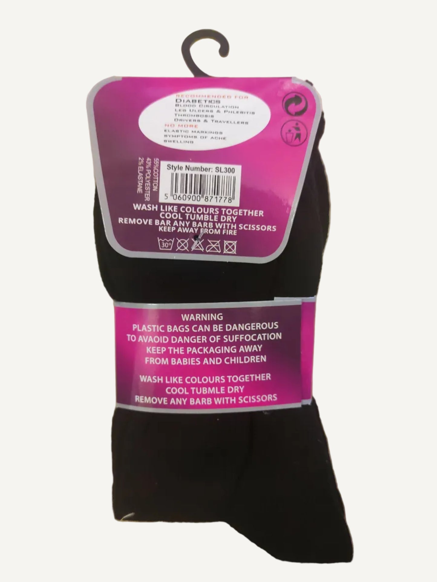 Black socks with pink packaging on a wooden surface