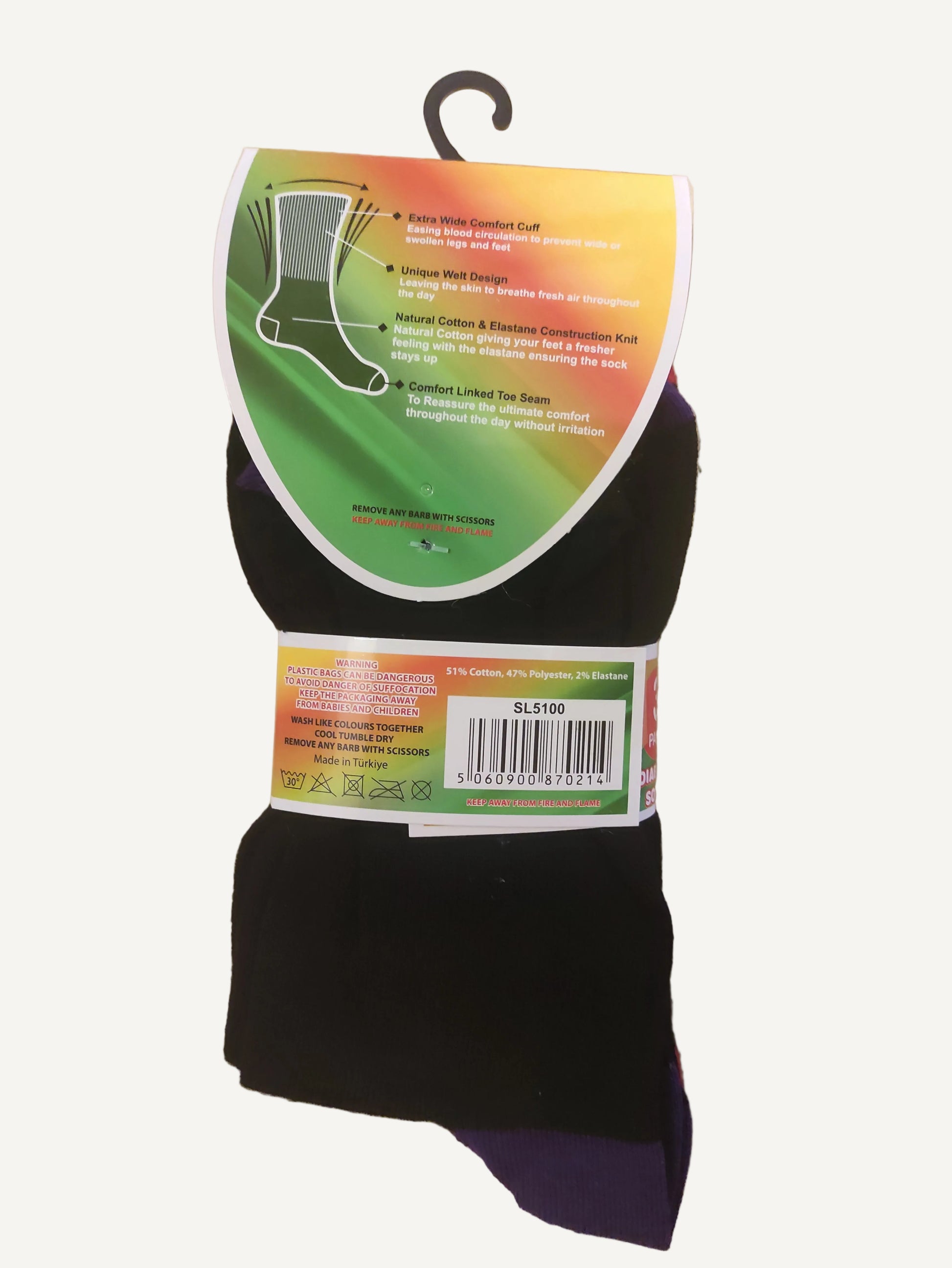 Black socks with colorful labels on a wooden surface
