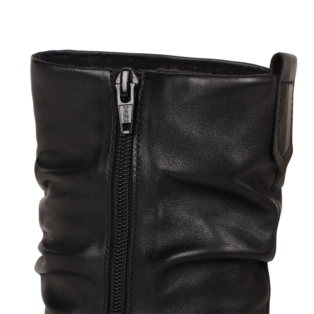 Black calf-length boot with textured ruched shaft and side zipper detail