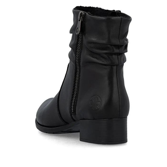 Black women's ankle boot with side zipper and ruched shaft, low block heel
