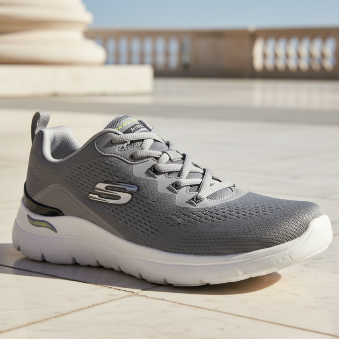 Men's Skechers charcoal knit trainers with white midsole and gray laces, side S logo