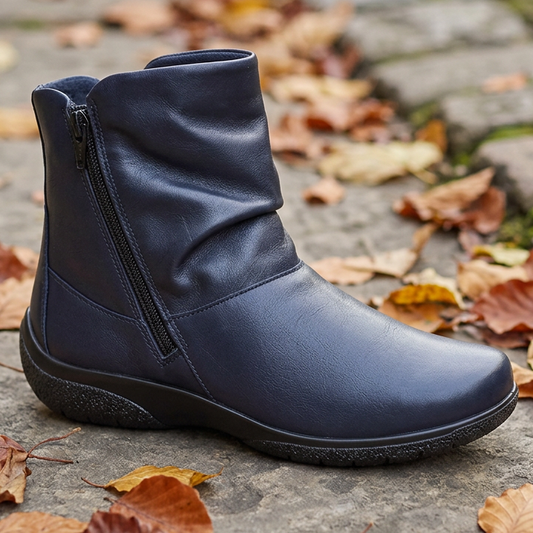 Women's navy wide-fit ankle boots with side zipper, smooth leather-look upper, textured sole