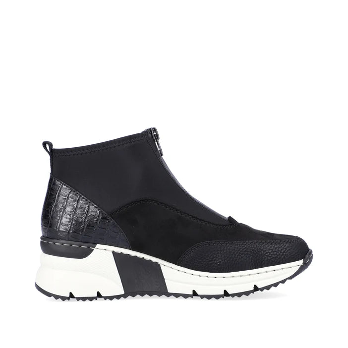 Women's black zip boot with thick white midsole and decorative side panel