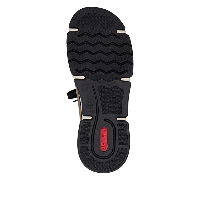 Shoe outsole tread with textured grip and cushioned heel insert