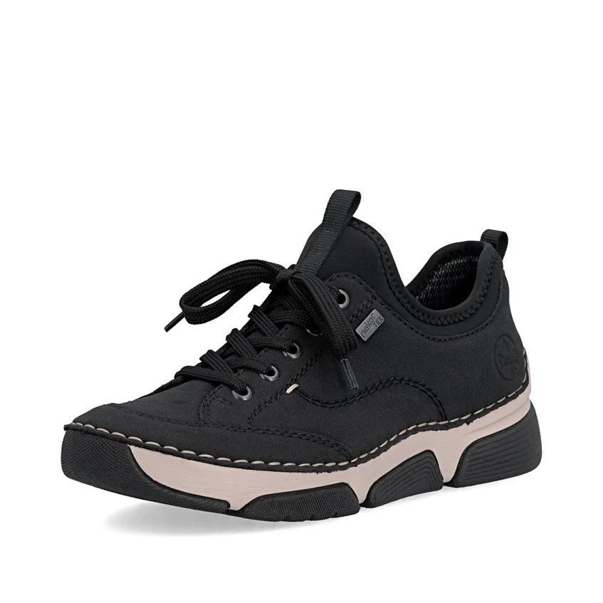 Black suede lace-up sneaker with cushioned white midsole and contrast stitching