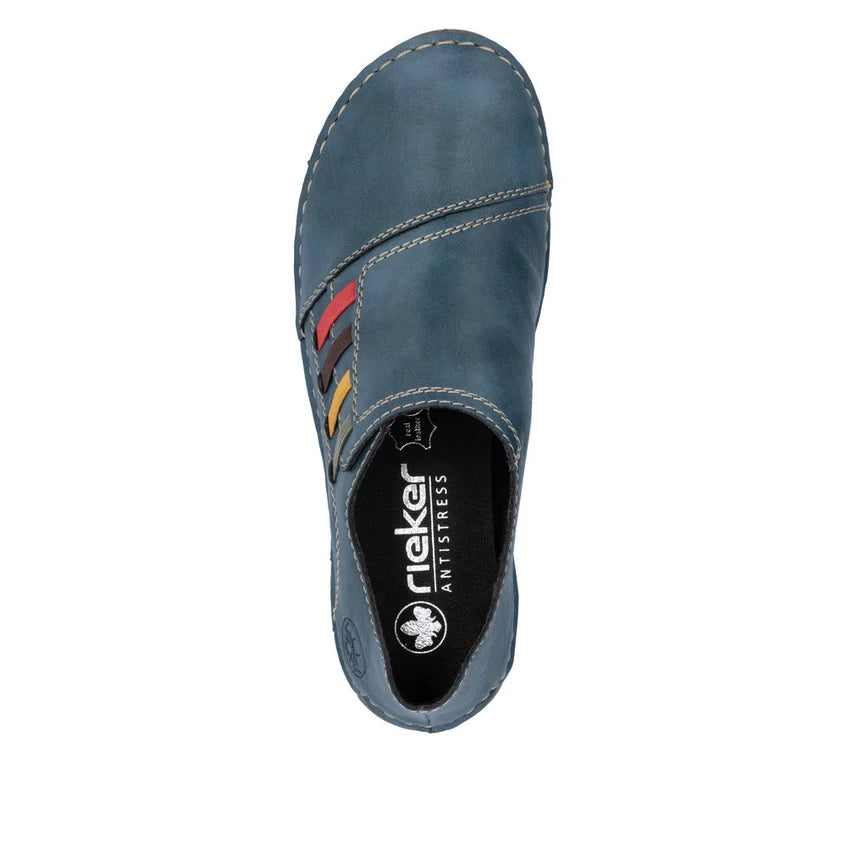 Blue slip-on shoe viewed from heel with cushioned interior