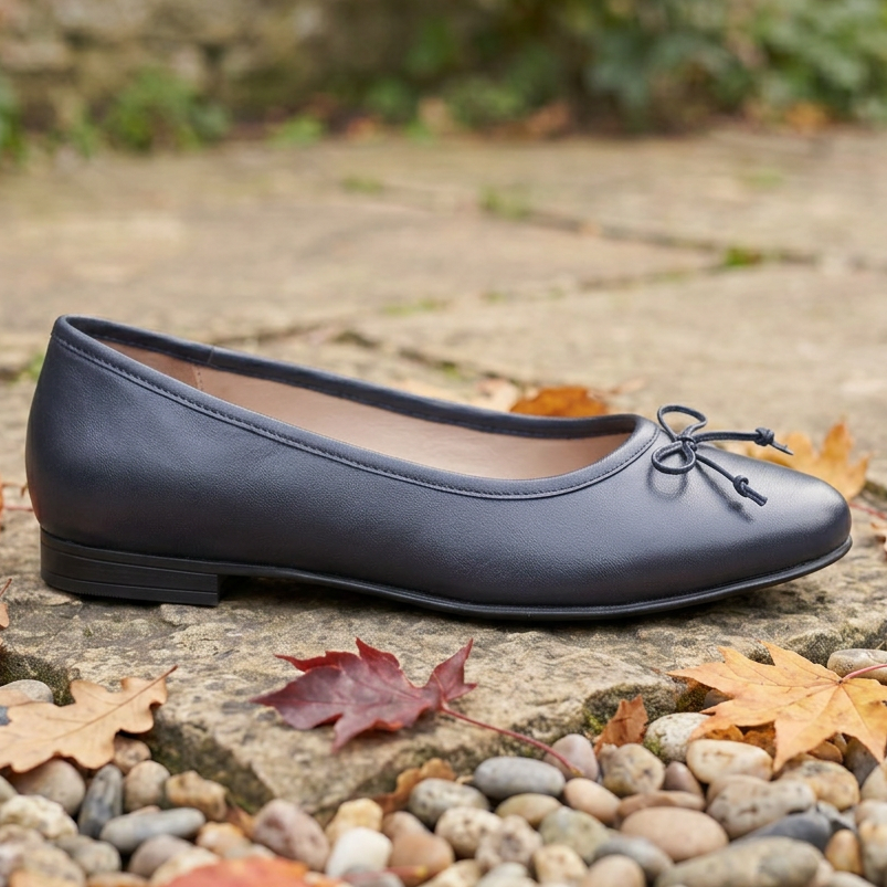 Navy leather ballerina shoe with bow tie detail and low block heel