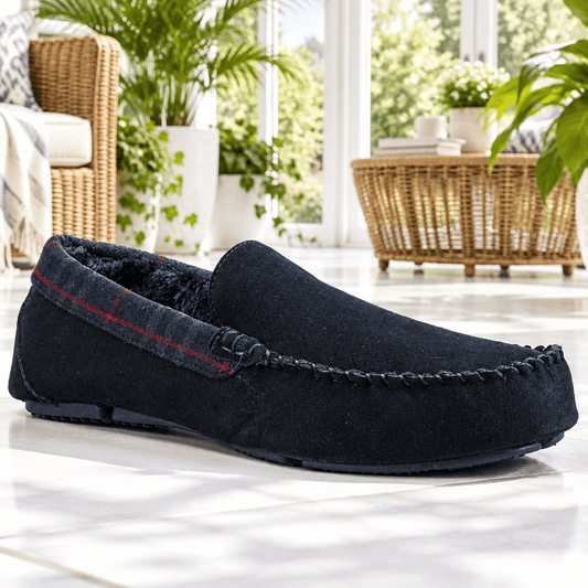 Navy suede moccasin slippers with tartan strap and dark moc-toe stitching