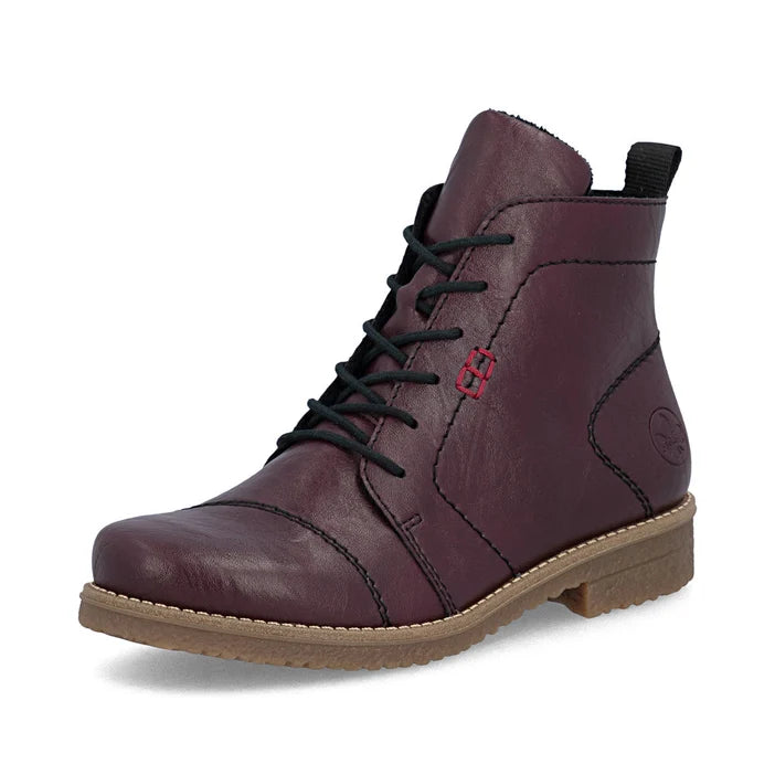 Women's lace-up ankle boot in burgundy leather with rubber sole and heel pull tab.