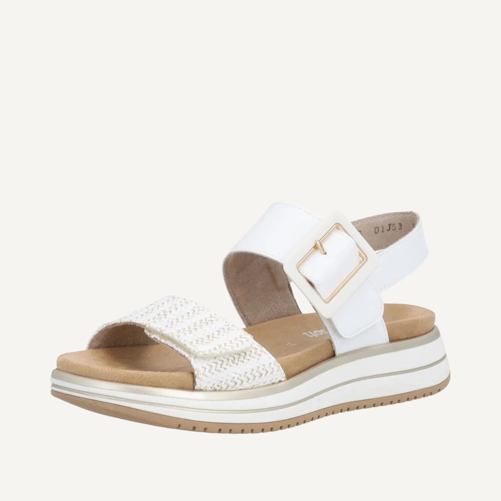 White sandal with brown sole on a white background