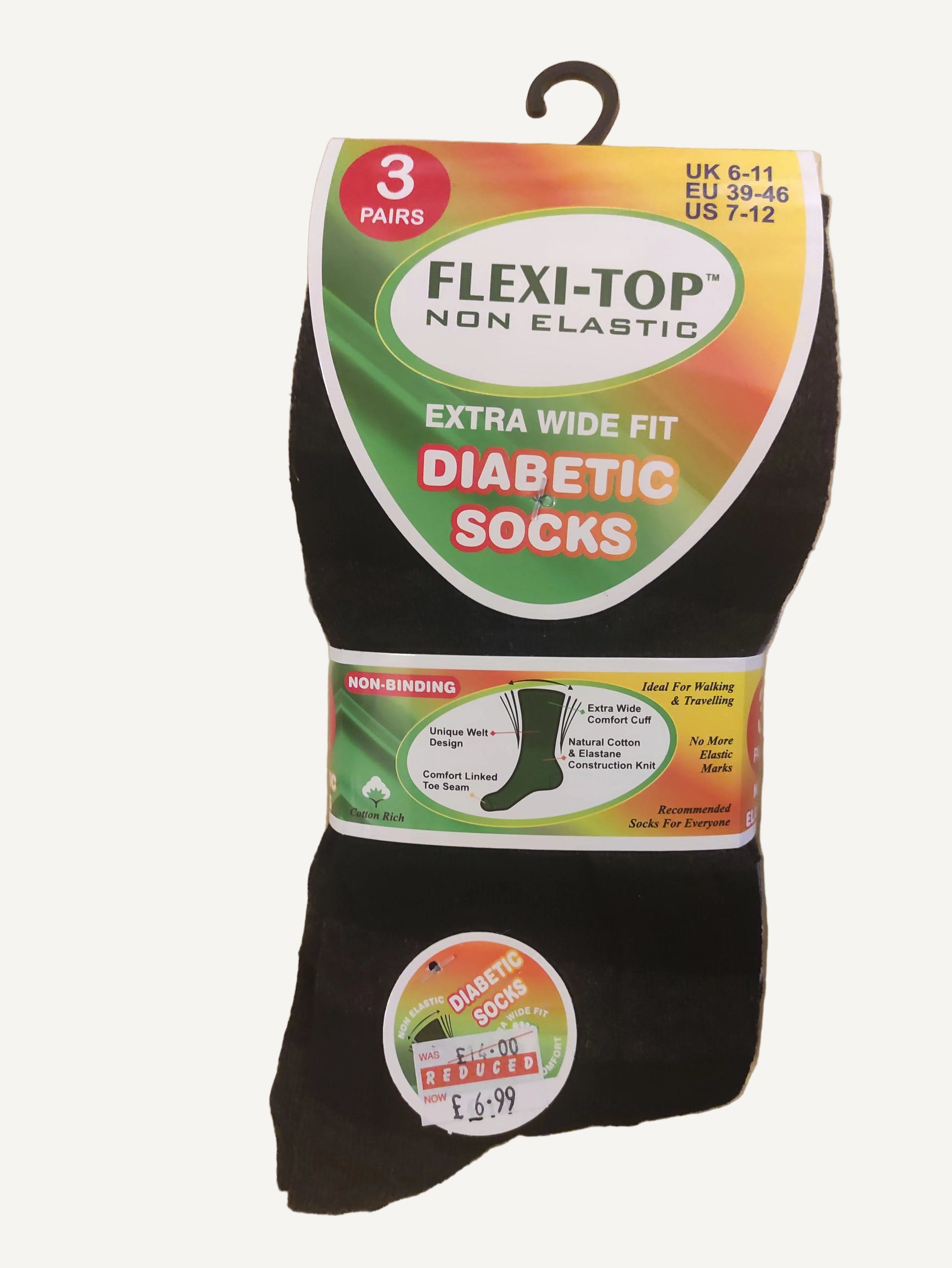 Pack of Flexi-Top diabetic socks on a wooden surface