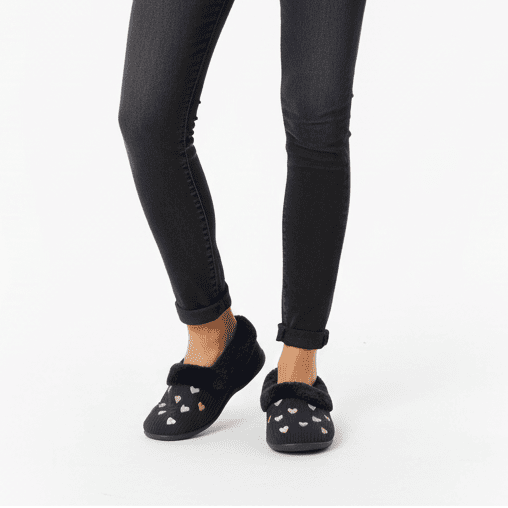 Navy slip-on slippers with fuzzy cuffs and pink heart pattern