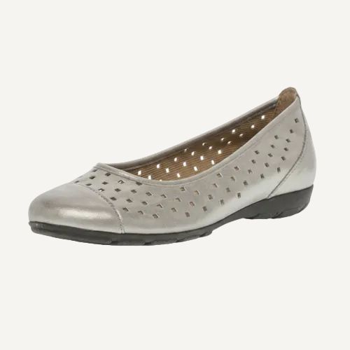 Silver perforated shoe on a white background