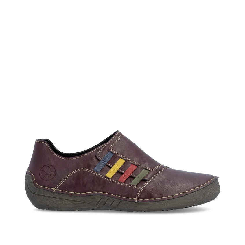 Women's slip-on shoe dark plum profile view with multicolor strap and cushioned footbed