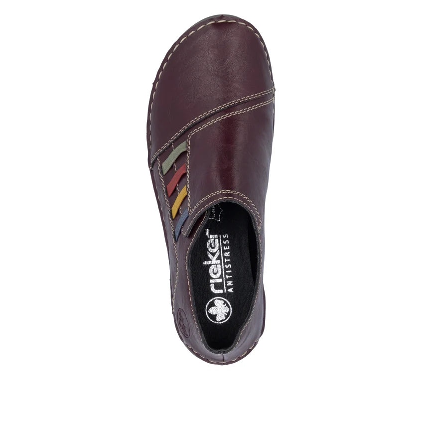 Women's slip-on shoe dark plum side view with multicolor strap and padded collar