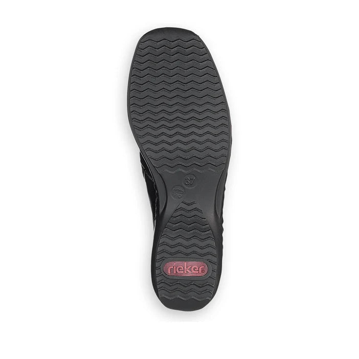 Women’s black ankle boot outsole with textured tread and Rieker logo