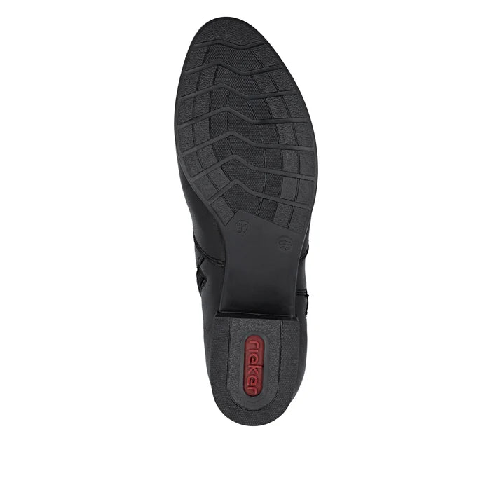 Black boot outsole with traction tread and Rieker logo