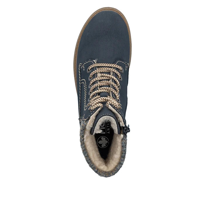 Blue lace-up biker boot with padded beige lining and rugged sole