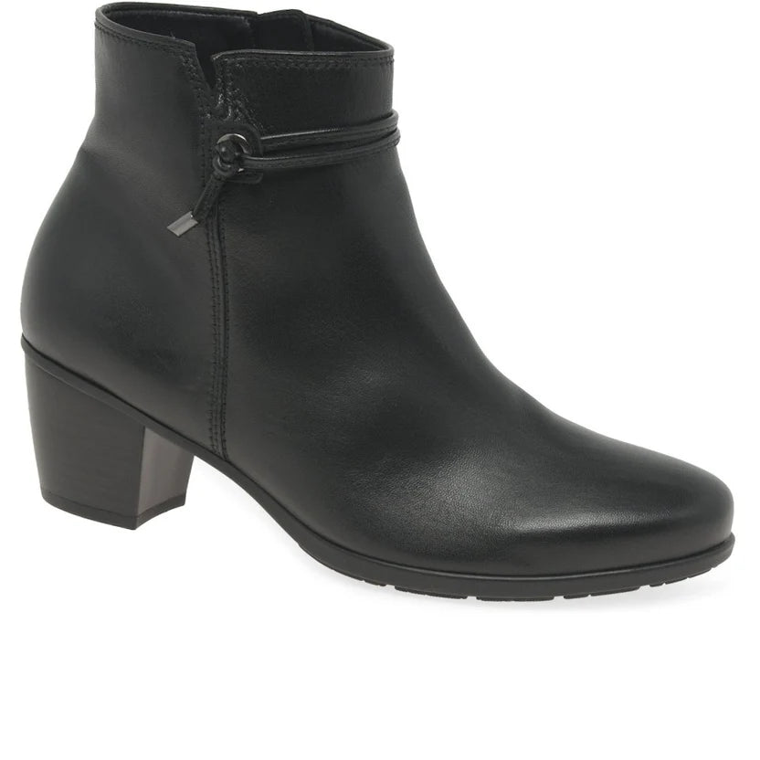 Women’s heeled ankle boots in black with strap-and-buckle detail and block heel