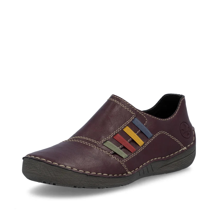Women's slip-on shoe in dark plum with multicolor strap detail and stitched trim