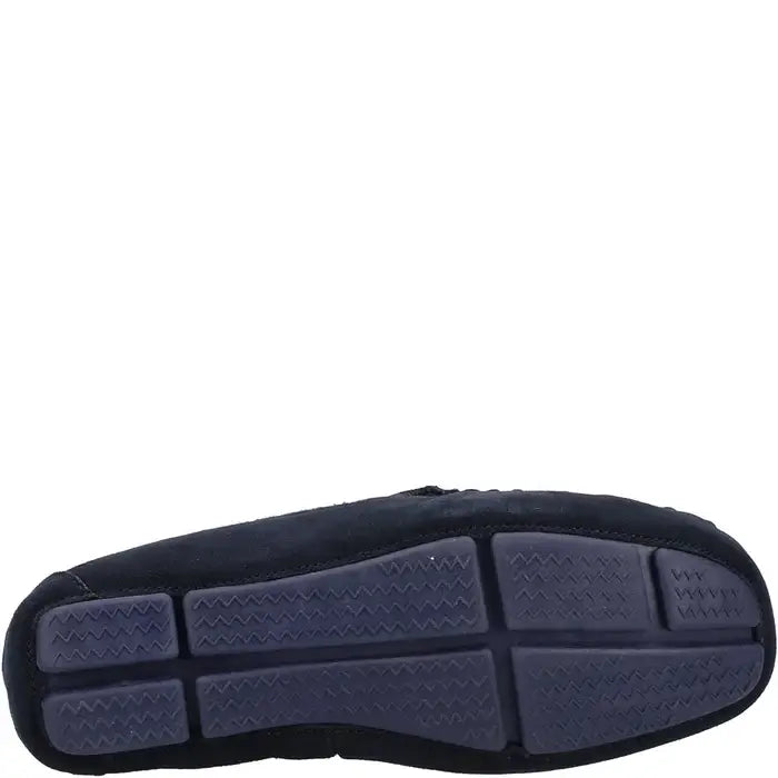 Navy suede moccasin slipper with textured rubber outsole