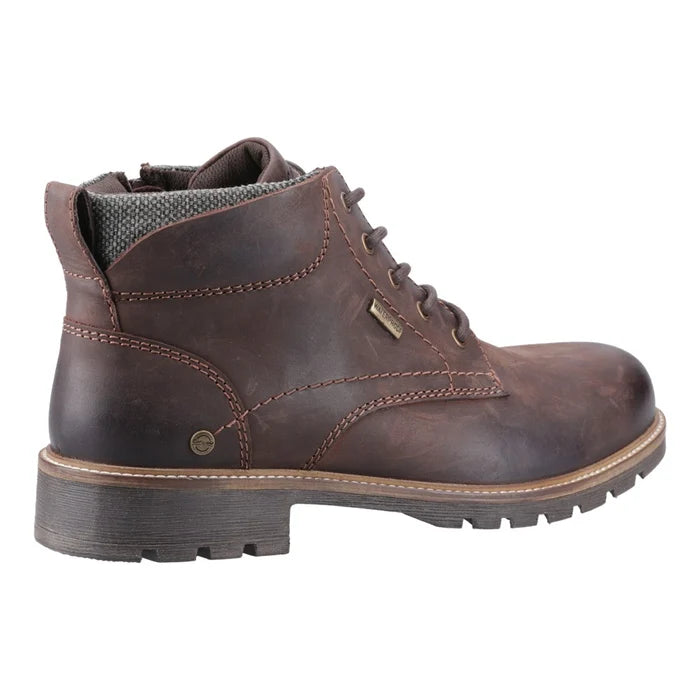 Brown lace-up work boot with metal eyelets, padded lining, and cushioned collar.