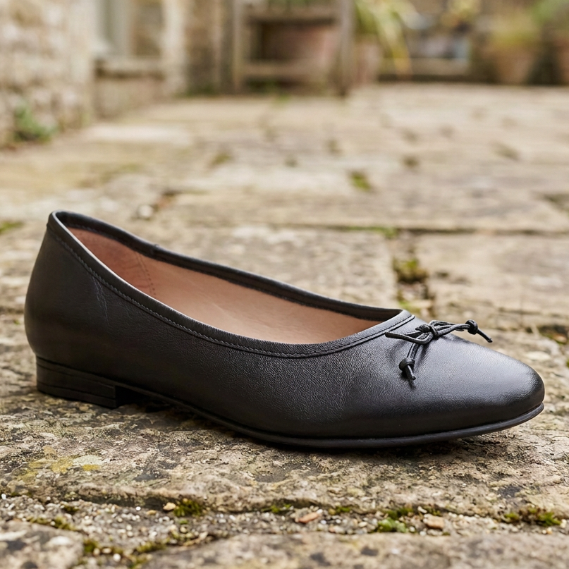 Women's black leather ballerina flat with lace bow and low block heel