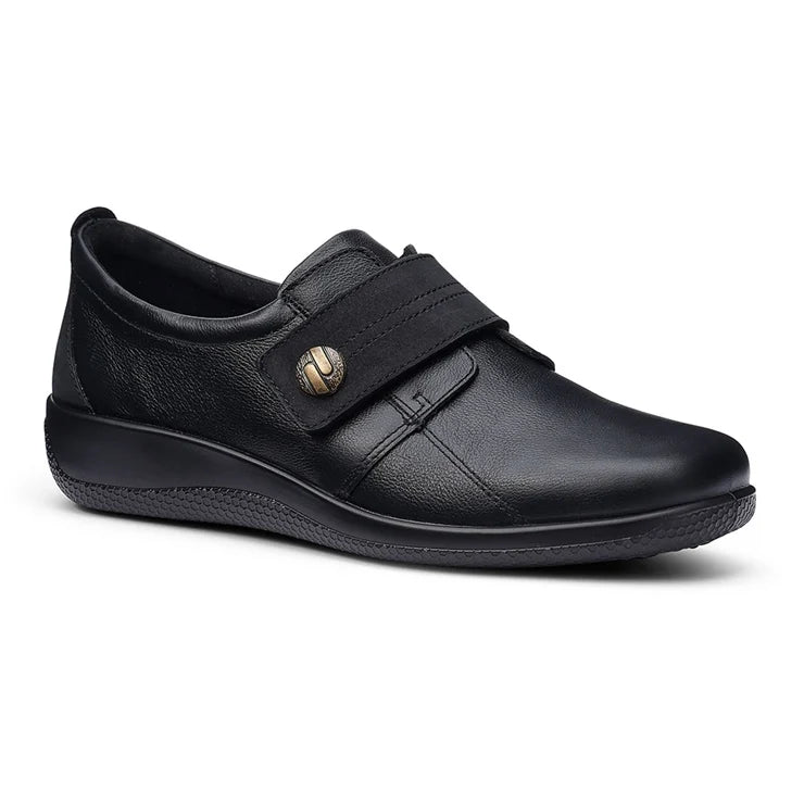 Black leather women's wide-fit shoe with adjustable strap and low-profile outsole