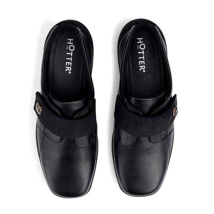 Pair of black leather wide-fit slip-ons with 'HOTTER' logo on the insole