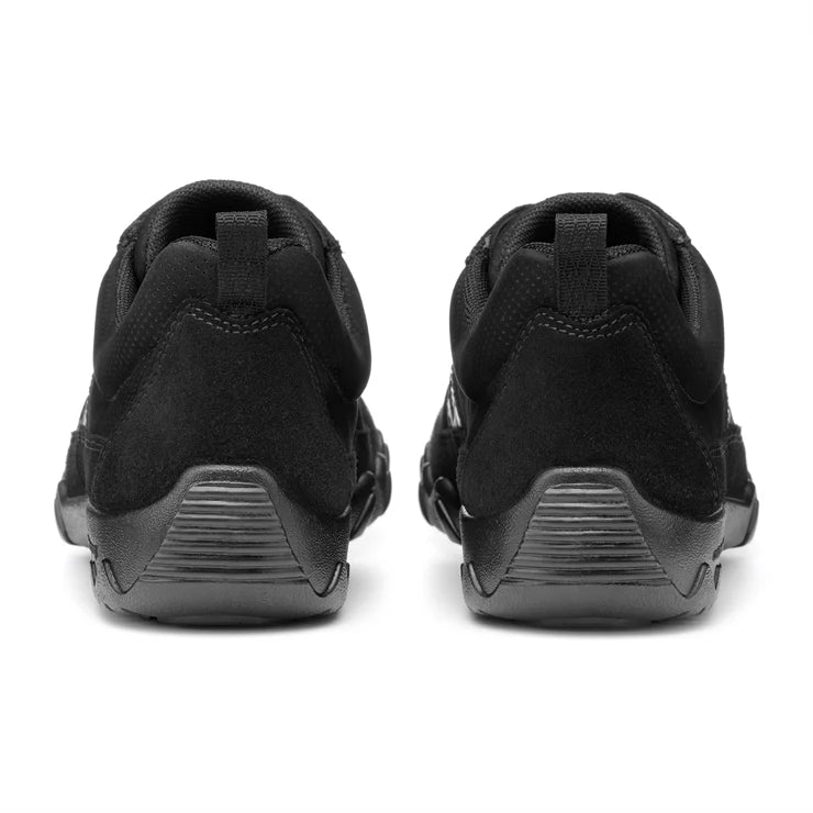 Black trainer heels with cushioned back and ridged rubber outsole