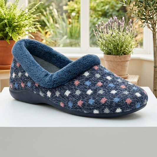 Women's navy slipper with star-pattern textile upper and thick padded rim