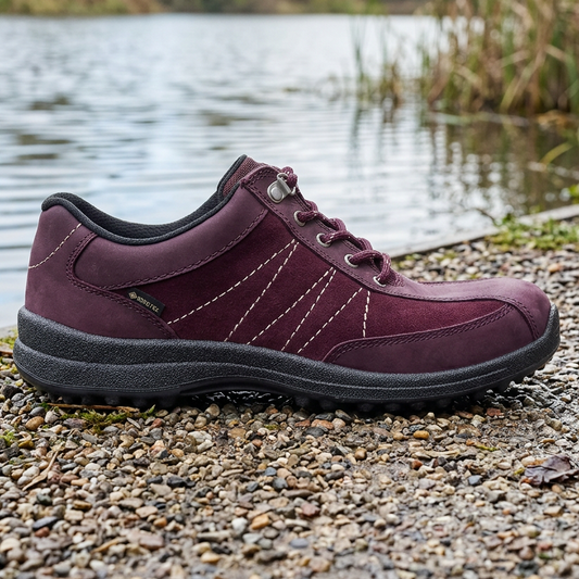 Women's dark cherry lace-up walking shoe with grippy black tread sole
